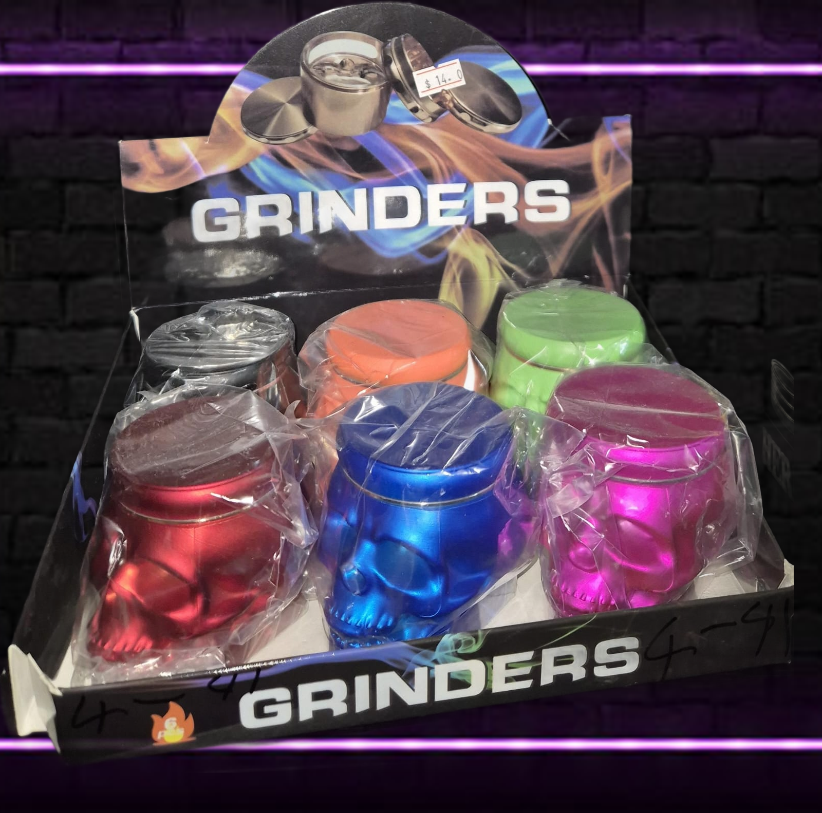 VIBRANT SKULL SHAPED TOBACCO GRINDERS 6 PER PACK